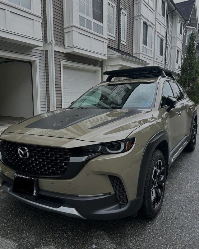 Mazda CX-50 with glossy paint after a wash and ceramic sealant